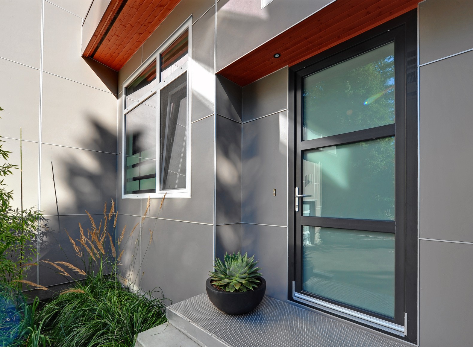Panelled door with vertical frosted-glass lights